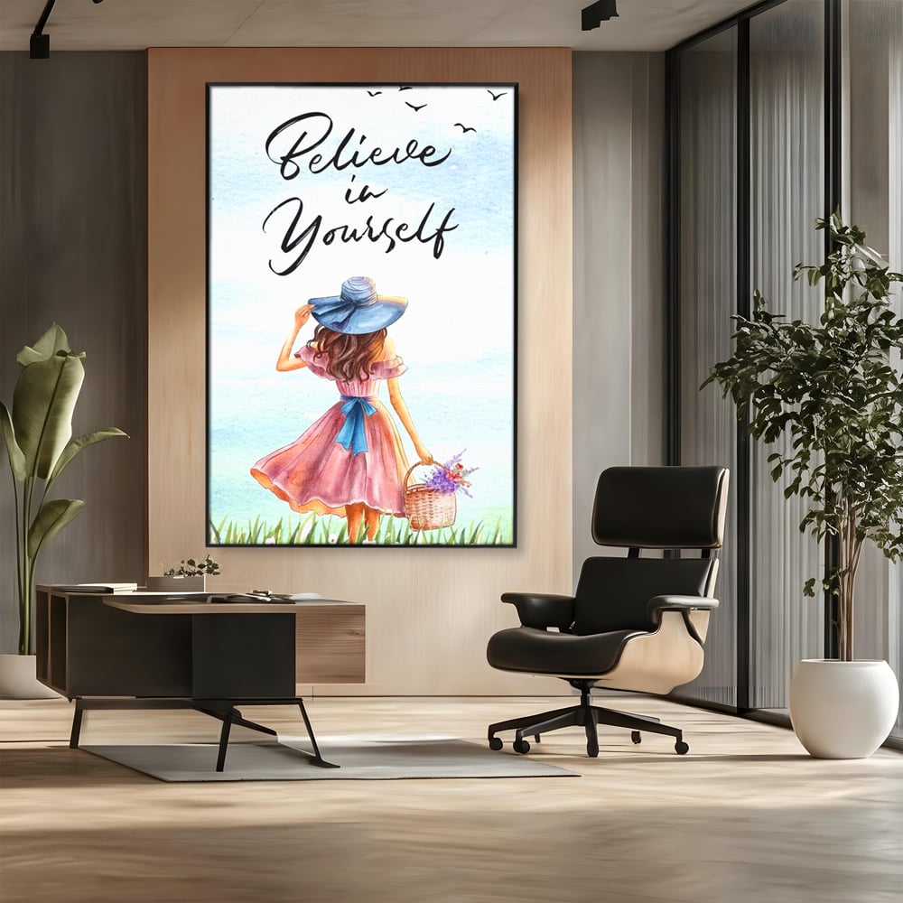 Tablou canvas cu ilustratie cu femeie si mesaj motivational, in rama de aluminiu negru, pe perete intr-un birou